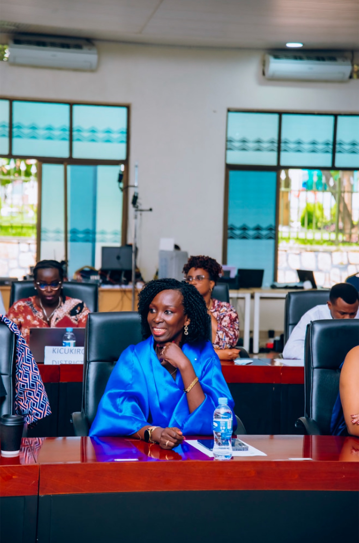 Autisme Rwanda director seated at the Kicukiro forum