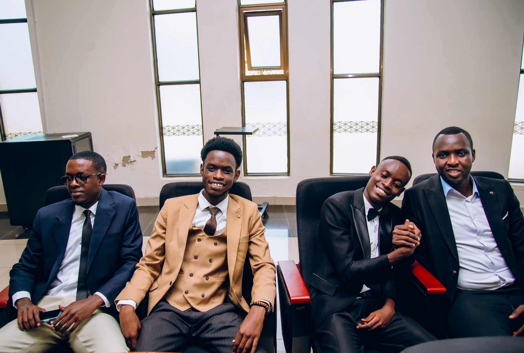 Autisme Rwanda youth and community leaders seated together