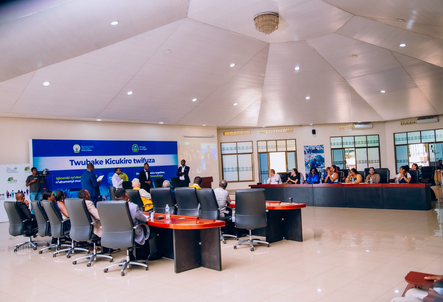 Wide view of the Kicukiro civic forum and panel