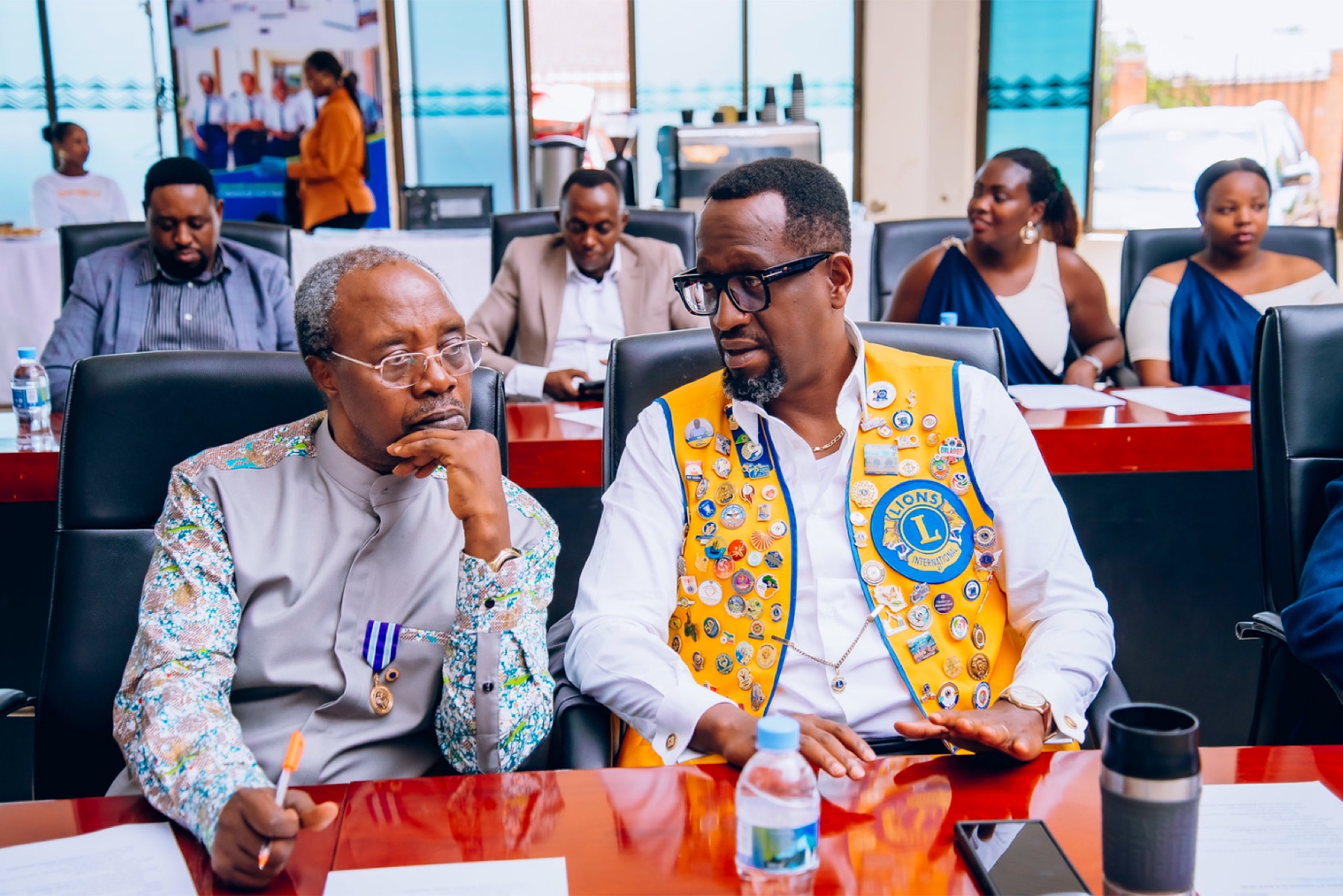 Lions Club leaders in conversation during the forum