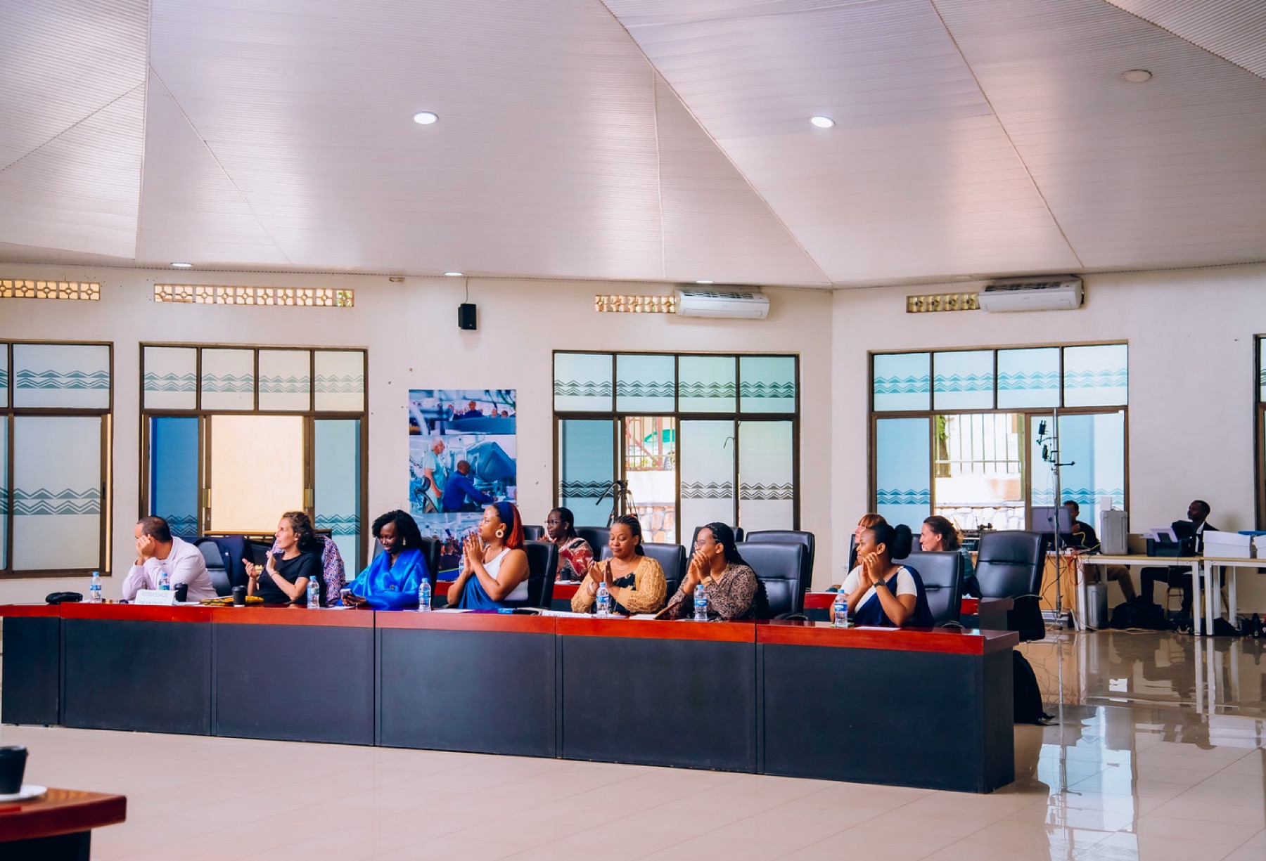 Partner delegates applauding during the event